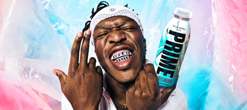 KSI in front of a frosted backdrop posing with a crisp bottle of Blue Chill PRIME ICE Hydration. 